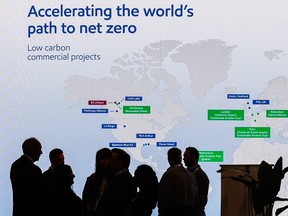 Delegates visit the Exxon Mobil exhibit at the World Petroleum Congress in Calgary on Wednesday, September 20, 2023.