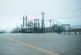 Gasoline prices surge, oil declines as Harvey shutters refineries